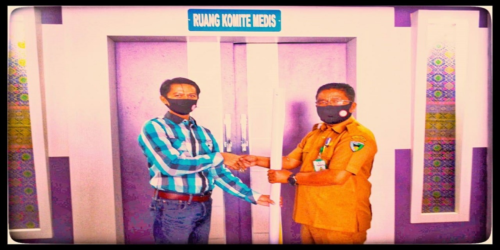 Penyerahan Spanduk dan Masker dari Ikatan Dokter Indonesia Wilayah Sumatera Barat 